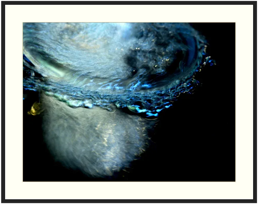 Macro photograph of fluid turbulence; chaotic liquid eddies; physical thermodynamic exhaust.